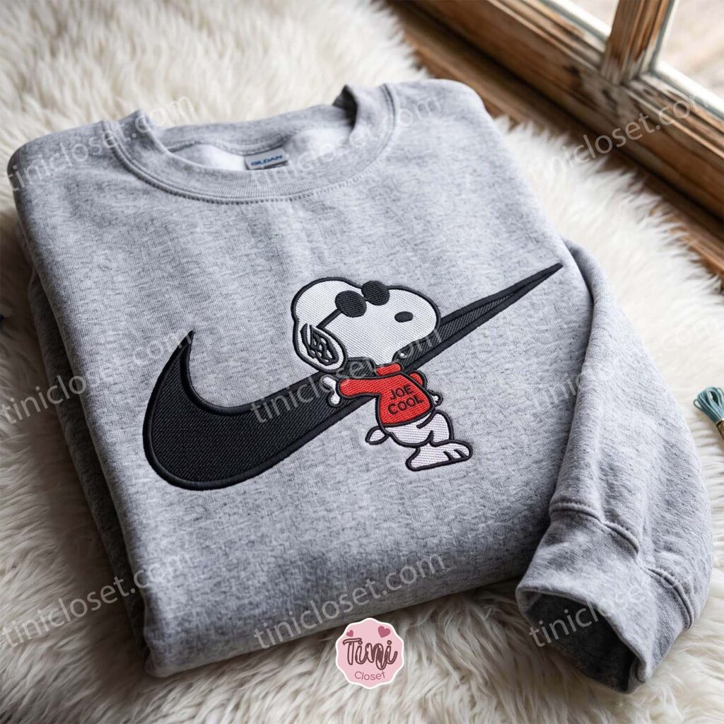 Snoopy Peanuts Swoosh Embroidered Sweatshirt, Cartoon Embroidered Shirt, Unique Family Gifts Snoopy Peanuts Swoosh Embroidered Sweatshirt, Cartoon Embroidered Shirt, Unique Family Gifts