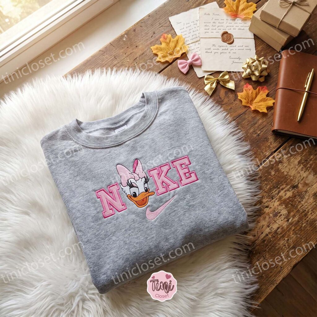 Daisy Duck Embroidered T-shirt, Vintage Disney Character Hoodie, Retro Sporty Cartoon Apparel, Birthday Gift for Her Daisy Duck Embroidered T-shirt, Vintage Disney Character Hoodie, Retro Sporty Cartoon Apparel, Birthday Gift for Her