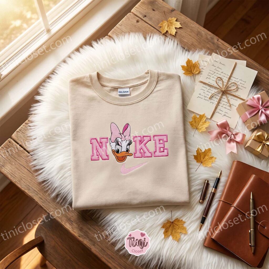 Daisy Duck Embroidered T-shirt, Vintage Disney Character Hoodie, Retro Sporty Cartoon Apparel, Birthday Gift for Her Daisy Duck Embroidered T-shirt, Vintage Disney Character Hoodie, Retro Sporty Cartoon Apparel, Birthday Gift for Her