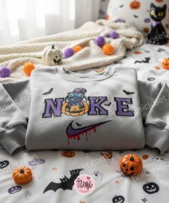 Stitch Witch Halloween Cosplay Embroidered Hoodie, Magic Jack O' Lantern Sweatshirt, Spooky Disney Witchcraft Apparel, Gift for Him Her 1 Stitch Witch Halloween Cosplay Embroidered Hoodie, Magic Jack O' Lantern Sweatshirt, Spooky Disney Witchcraft Apparel, Gift for Him Her (2)