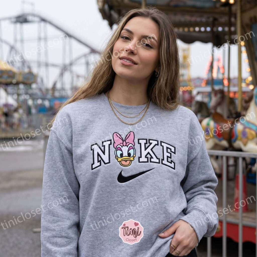 Smiling Daisy Duck Embroidered Shirt, Disney Characters Embroidered Hoodie, Cozy Gifts For Girlfriend Smiling Daisy Duck Embroidered Shirt, Disney Characters Embroidered Hoodie, Cozy Gifts For Girlfriend