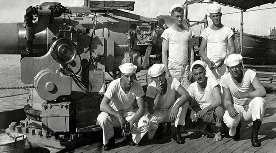 The U.S. Navy introduced a lightweight, short-sleeved undershirt made from white cotton to be worn under uniforms.