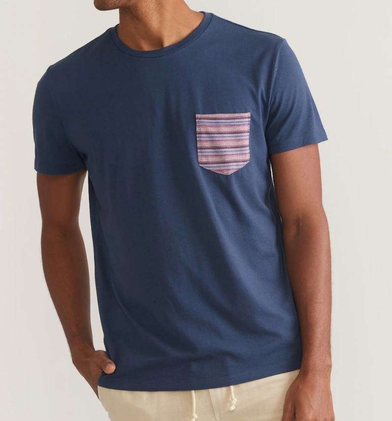 The pocket on a T-shirt adds a sense of structure and utility.