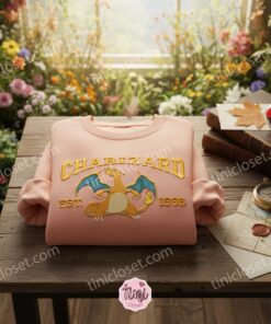 Charizard Pokemon Shirt, Embroidered Anime Gift for Him, Charizard Evolution Hoodie, Minimalist Pokemon Crewneck 1 Charizard Pokemon Shirt, Embroidered Anime Gift for Him, Charizard Evolution Hoodie, Minimalist Pokemon Crewneck (1)