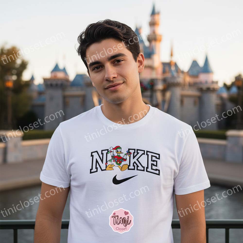 Donald Duck Christmas Lights Embroidered Shirt, Disney Characters Embroidered Hoodie, Christmas Embroidered Sweatshirt Donald Duck Christmas Lights Embroidered Shirt, Disney Characters Embroidered Hoodie, Christmas Embroidered Sweatshirt