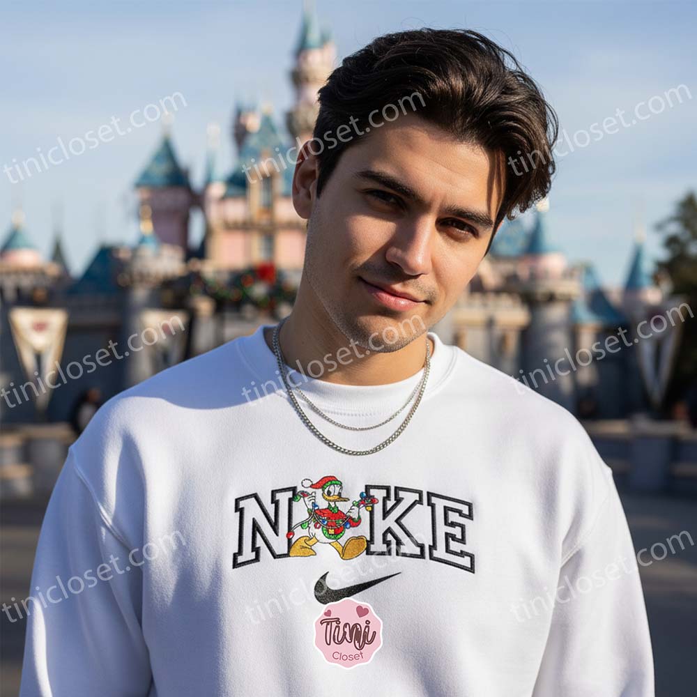 Donald Duck Christmas Lights Embroidered Shirt, Disney Characters Embroidered Hoodie, Christmas Embroidered Sweatshirt Donald Duck Christmas Lights Embroidered Shirt, Disney Characters Embroidered Hoodie, Christmas Embroidered Sweatshirt