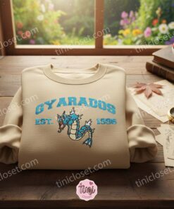 Gyarados Est. 1996 Vintage Collegiate Crewneck, Pokemon Inspired Embroidered Sweatshirt, Cozy Gifts For Friend and Gamers 1 Gyarados Est. 1996 Vintage Collegiate Crewneck, Pokemon Inspired Embroidered Sweatshirt, Cozy Gifts For Friend and Gamers (2)