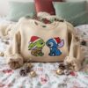 Stitch and Baby Yoda Christmas Embroidered Hoodie, Grogu and Experiment 626 Holiday Sweatshirt, Galactic Xmas Crewneck, Gift for Him Her