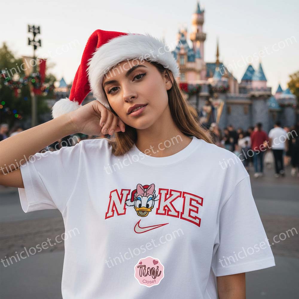 Christmas Daisy Duck Embroidered Sweatshirt, Santa Duck Disney Holiday Shirt, Custom Nike Inspired Xmas Hoodie, Disney Character Christmas Embroidered Apparel Christmas Daisy Duck Embroidered Sweatshirt, Santa Duck Disney Holiday Shirt, Custom Nike Inspired Xmas Hoodie, Disney Character Christmas Embroidered Apparel