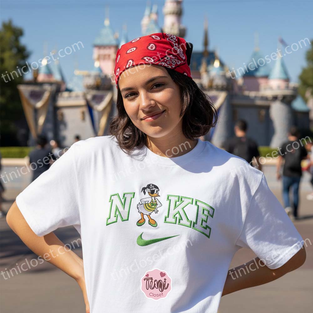 Daisy Duck Pirate Embroidered Shirt, Disney Character Embroidered Hoodie, Custom Nike Inspired Sportswear Hoodie, Funny Duck Embroidered Crewneck Daisy Duck Pirate Embroidered Shirt, Disney Character Embroidered Hoodie, Custom Nike Inspired Sportswear Hoodie, Funny Duck Embroidered Crewneck