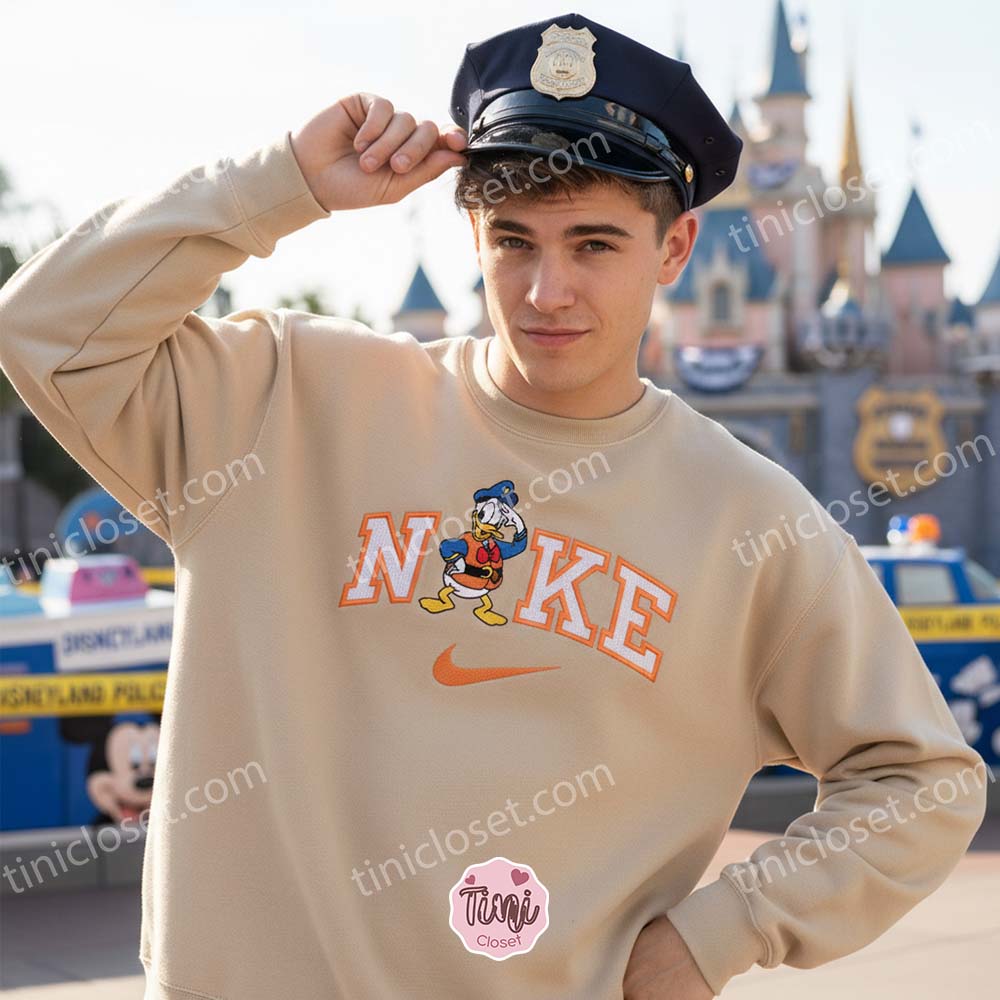 Donald Duck Police Embroidered Sweatshirt, Disney Character Career Apparel Hoodie, Custom Nike Inspired Police Duck Shirt, Funny Cartoon Police Officer Crewneck Donald Duck Police Embroidered Sweatshirt, Disney Character Career Apparel Hoodie, Custom Nike Inspired Police Duck Shirt, Funny Cartoon Police Officer Crewneck