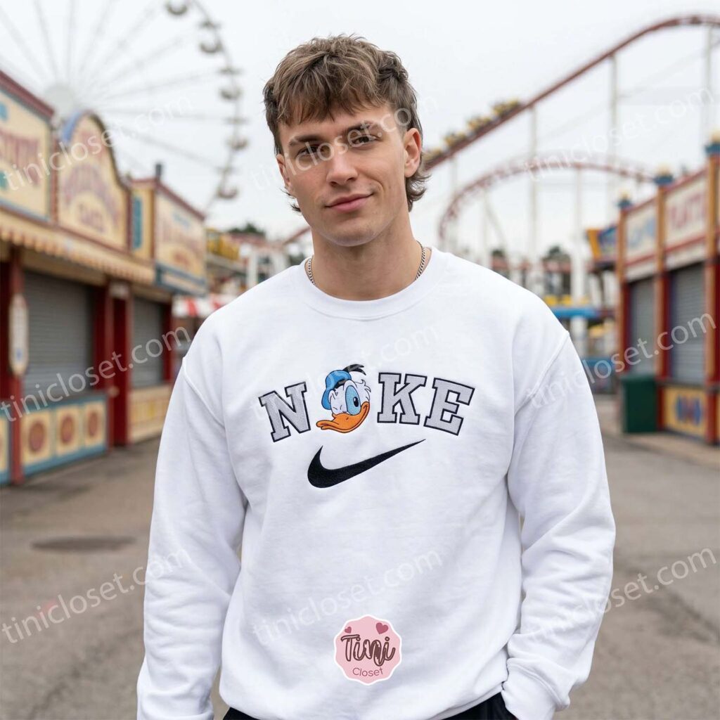 Donald Duck Embroidered Sweatshirt, Disney Character Nike Inspired Hoodie, Custom Donald Duck Embroidered Shirt, Retro Cartoon Sportswear Crewneck Donald Duck Embroidered Sweatshirt, Disney Character Nike Inspired Hoodie, Custom Donald Duck Embroidered Shirt, Retro Cartoon Sportswear Crewneck