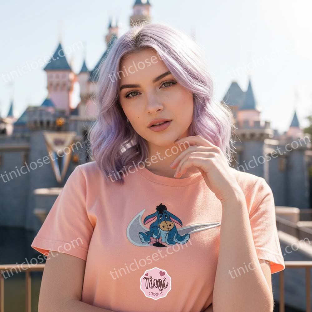 Eeyore Swoosh Hoodie, Disney Character Embroidered Sweatshirt, Custom Winnie the Pooh Bear Apparel for Fans, Retro Cartoon Pullover Eeyore Swoosh Hoodie, Disney Character Embroidered Sweatshirt, Custom Winnie the Pooh Bear Apparel for Fans, Retro Cartoon Pullover