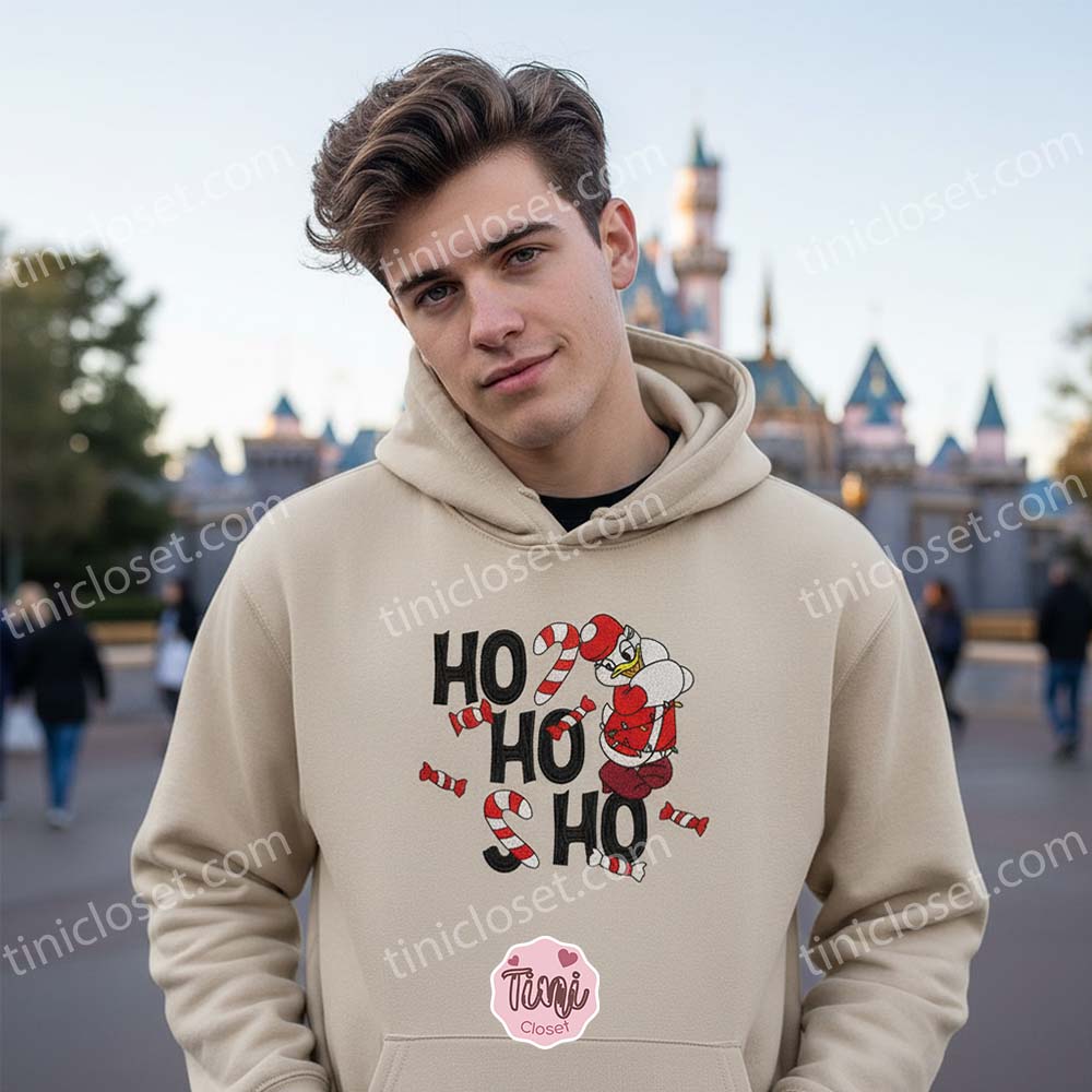 Embroidered Ho Ho Ho Christmas Daisy Duck Sweatshirt, Festive Holiday Crewneck & Hoodie, Cozy Gifts For Friends Embroidered Ho Ho Ho Christmas Daisy Duck Sweatshirt, Festive Holiday Crewneck & Hoodie, Cozy Gifts For Friends