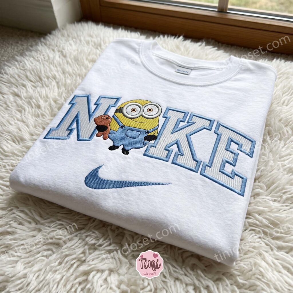 Minion Bob Hugging Tim Bear Embroidered Sweatshirt, Minions Movie Characters Embroidered Shirt, Cozy Gifts For Girlfriend
