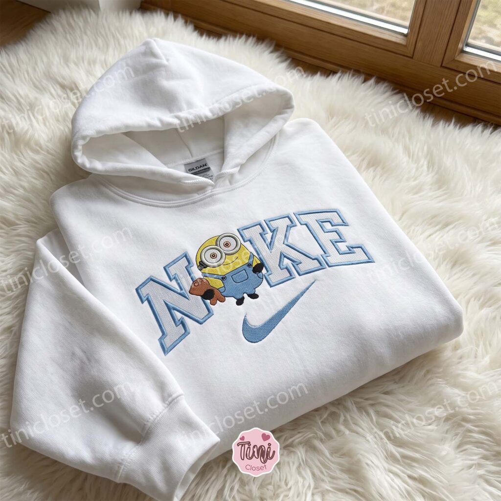 Minion Bob Hugging Tim Bear Embroidered Sweatshirt, Minions Movie Characters Embroidered Shirt, Cozy Gifts For Girlfriend
