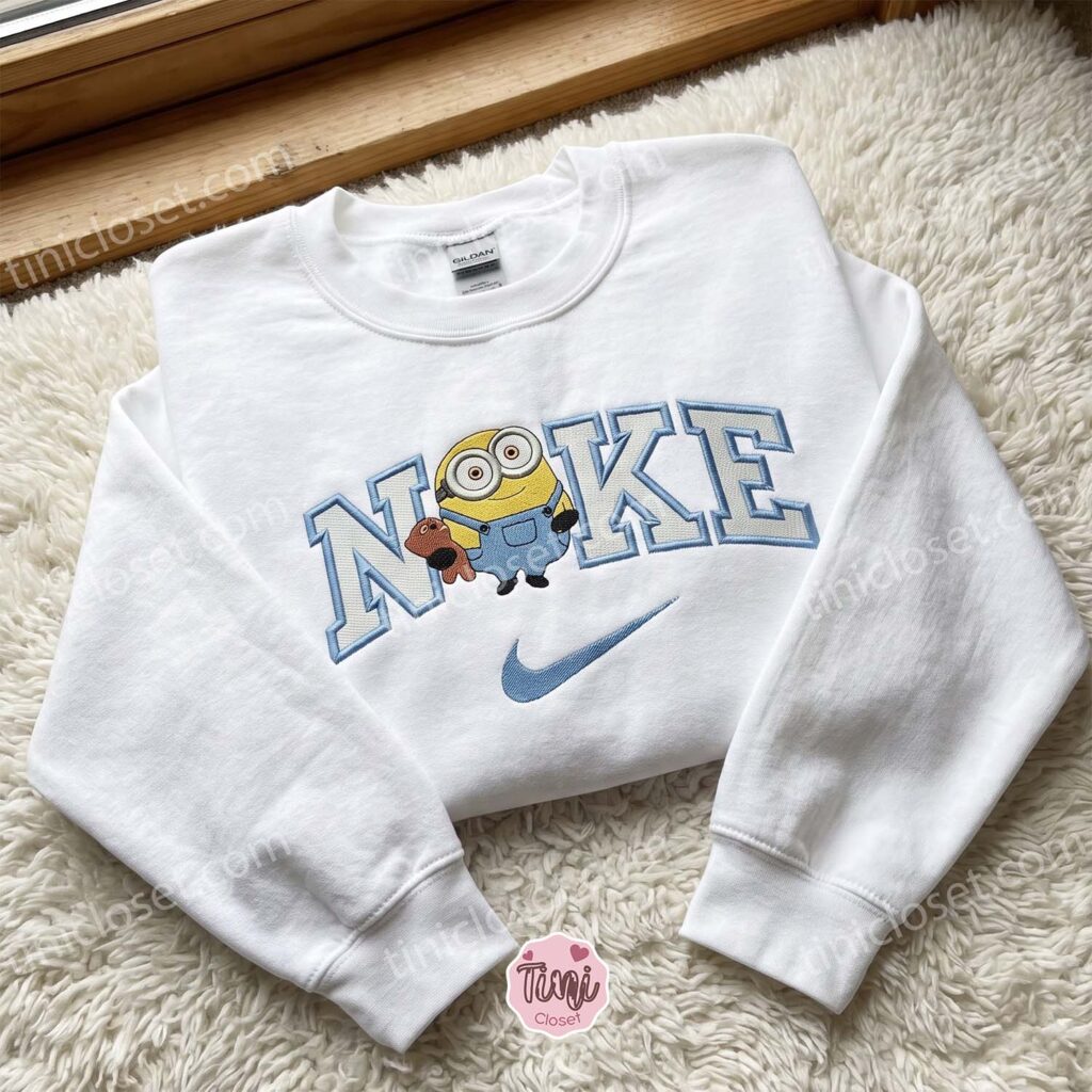Minion Bob Hugging Tim Bear Embroidered Sweatshirt, Minions Movie Characters Embroidered Shirt, Cozy Gifts For Girlfriend