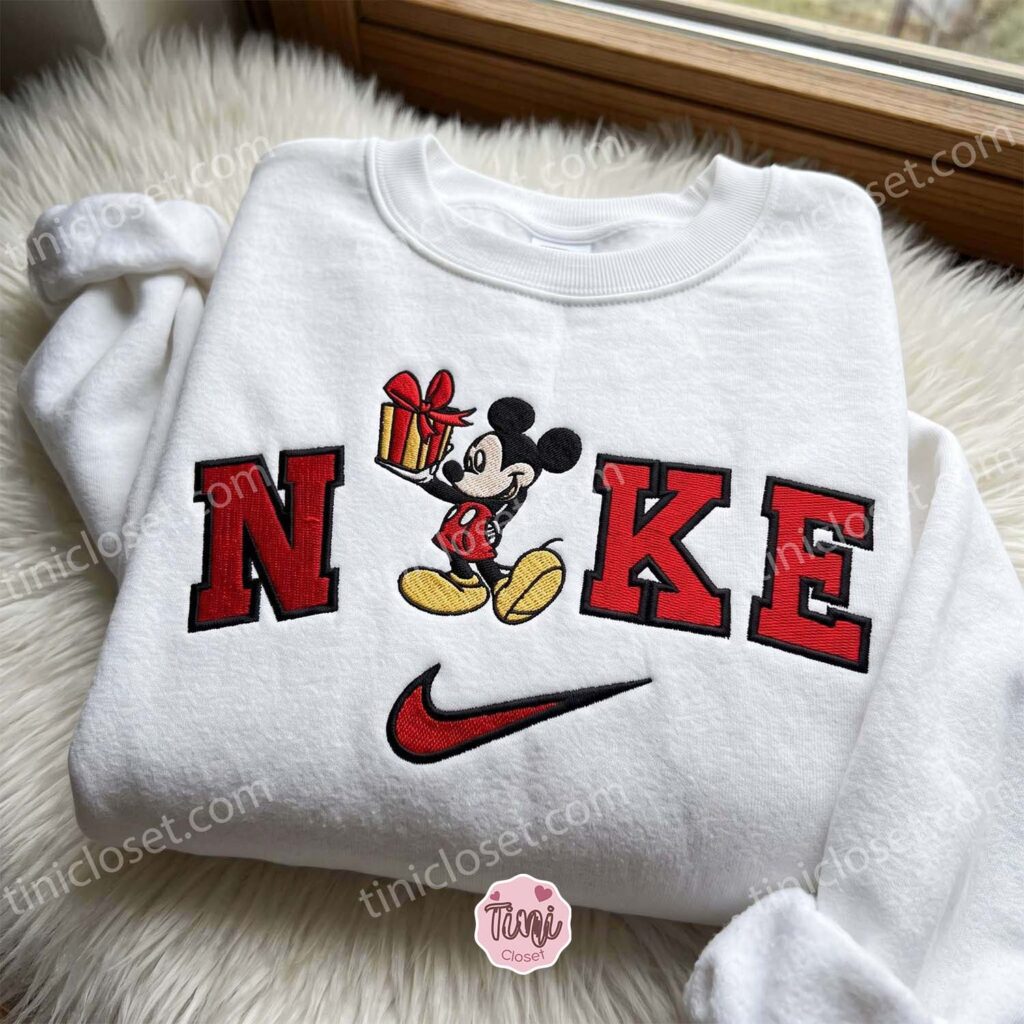 Mickey Mouse Holding A Gift Box Embroidered Sweatshirt, Disney Embroidered Hoodie, Just Because Gift For Him, Cozy Gifts For Girlfriend Mickey Mouse Holding A Gift Box Embroidered Sweatshirt, Disney Embroidered Hoodie, Just Because Gift For Him, Cozy Gifts For Girlfriend