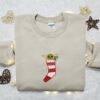 Baby Yoda Hide In Christmas Sock Embroidered Shirt, Christmas Embroidered Hoodie, Best Gifts For Family