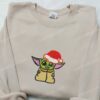 Baby Yoda With Christmas Hat Embroidered Shirt, Christmas Embroidered Hoodie, Best Gifts For Family