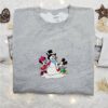 Mickey And Minnie Building Snowman Embroidered Shirt, Disney Characters Embroidered Hoodie, Best Christmas Gifts For Family