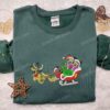 Mickey And Minnie Riding Pluto Sleigh Embroidered Shirt, Disney Characters Embroidered Hoodie, Christmas Embroidered Shirt