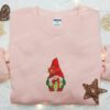 Gnome Holding Gift Embroidered T-shirt, Christmas Embroidered T-shirt, Best Christmas Gift Ideas For Family