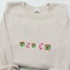 Kirby Eating Christmas Gift Embroidered Shirt, Game Character Embroidered Hoodie, Christmas Embroidered Sweatshirt